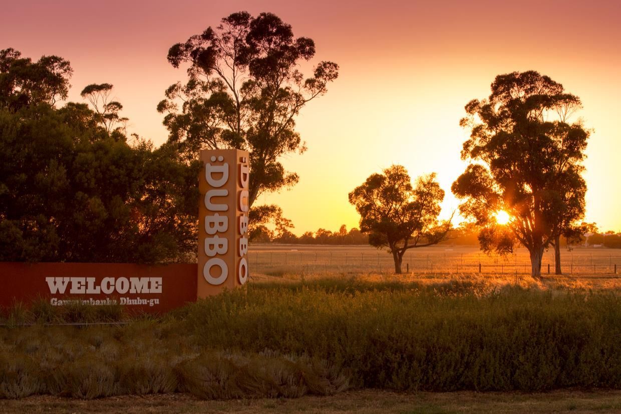 White Building with Black Trim and A Sign — Wright Partners in Dubbo, NSW