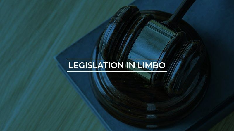 A Gavel on A Wooden Block with The Words Legislation in Limbo Overlaid in White — Wright Partners in Dubbo, NSW
