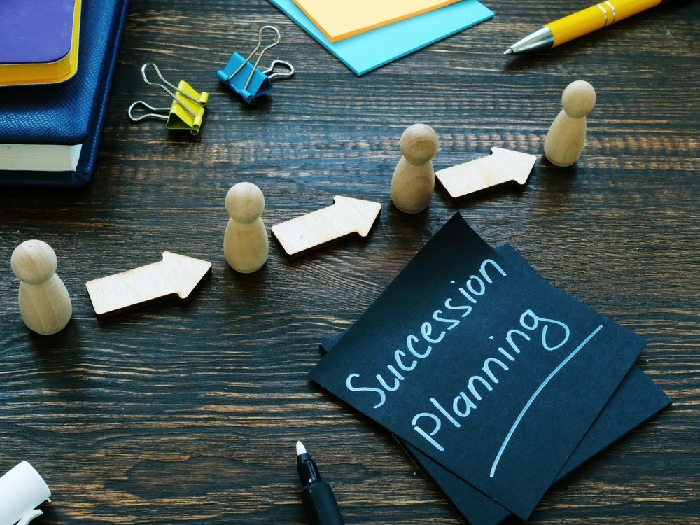 Succession Planning Concept with Wooden Figures — Wright Partners in Dubbo, NSW