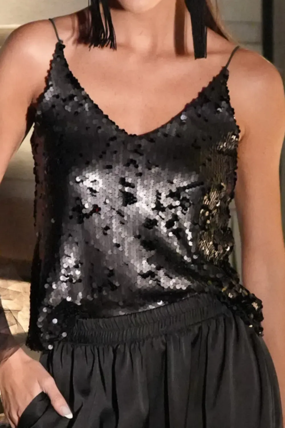 Remera con lentejuelas negra