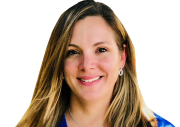 A person wearing a dark suit and red tie against a plain light background.