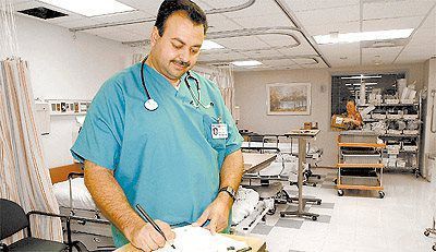 Nurse Checking Patients Information