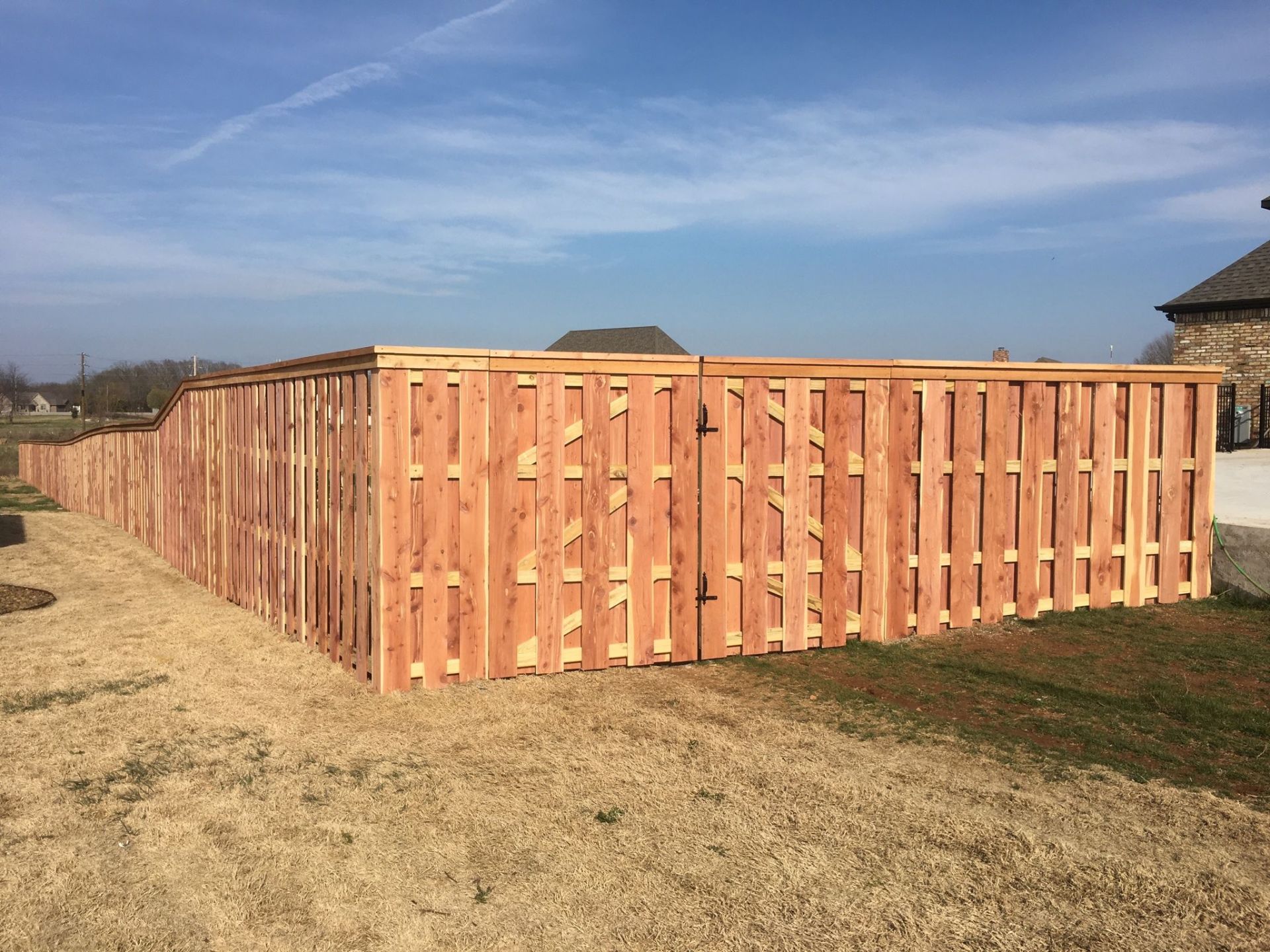 a board on board wooden fence