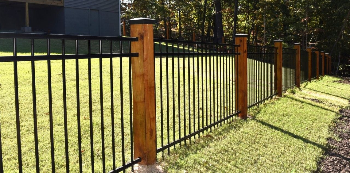 Ornamental Iron Fence with Wood Posts
