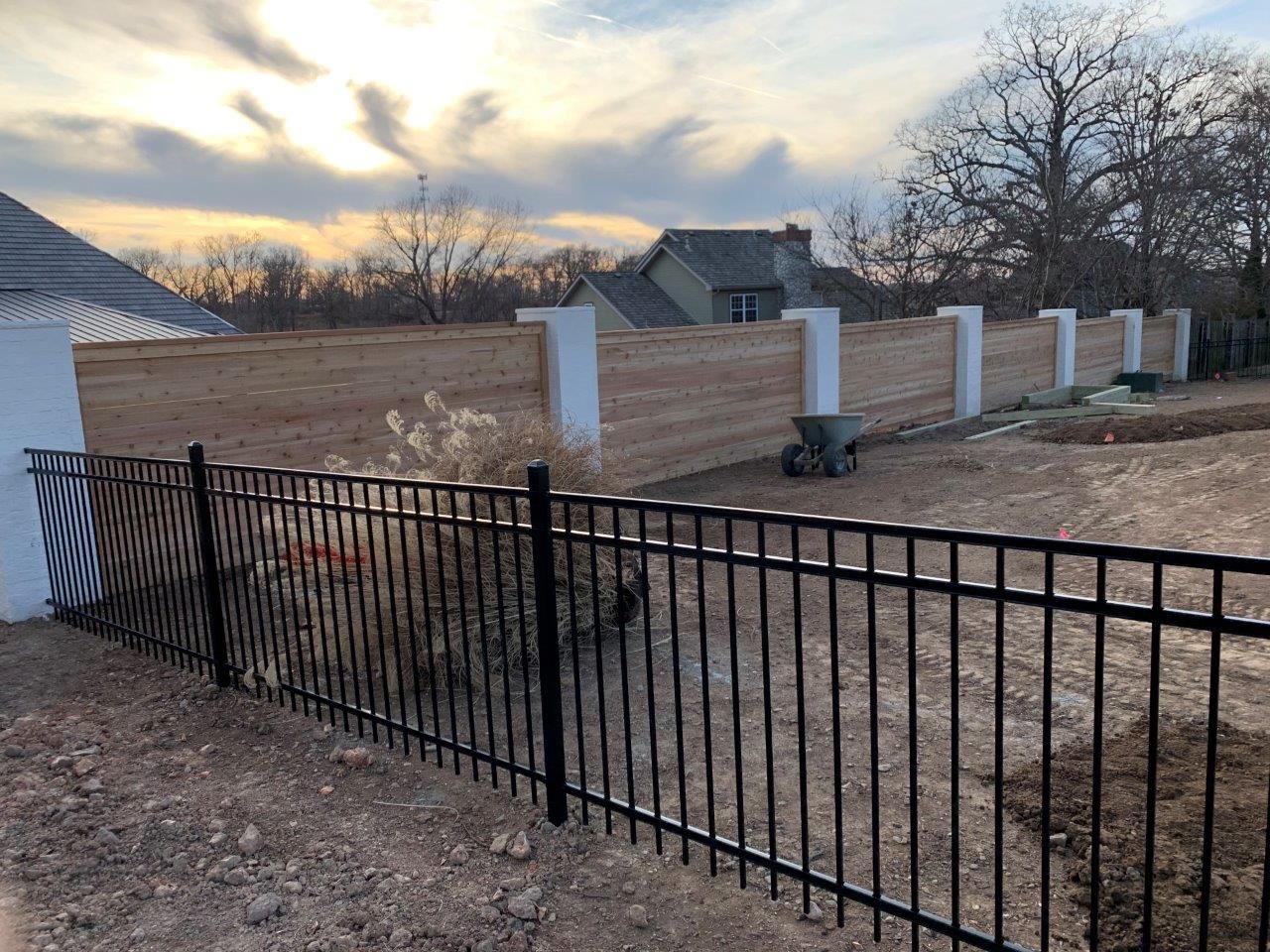 wooden fence with white columns