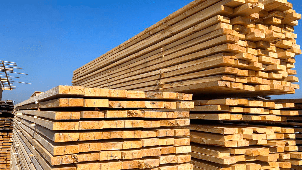 A pile of wooden boards stacked on top of each other.