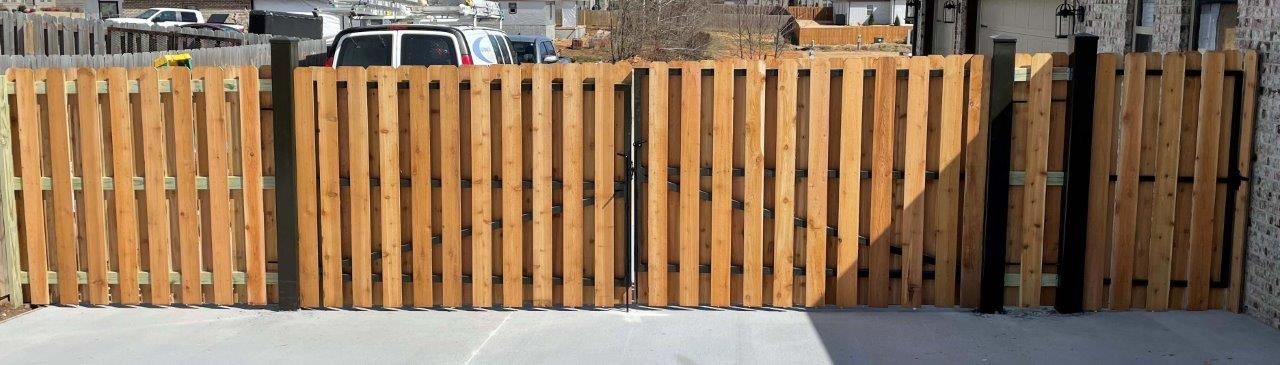 wooden gate with metal posts