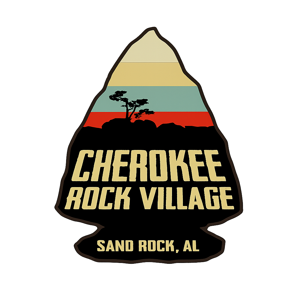 Cherokee Rock Village logo: arrowhead shape with layered mountain scene and text.