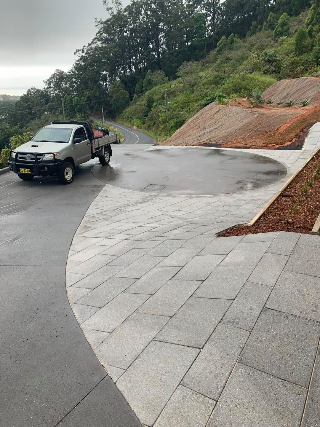 A Silver Truck Parked on A Paved Driveway — Creative Landscapes Coffs Harbour in Korora, NSW
