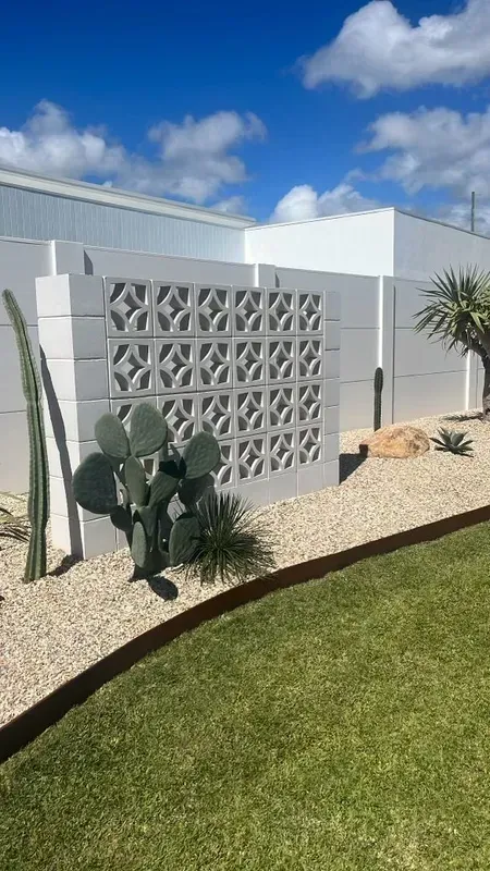 A White Breeze Block Wall with A Geometric Pattern — Creative Landscapes Coffs Harbour in Woolgoolga, NSW