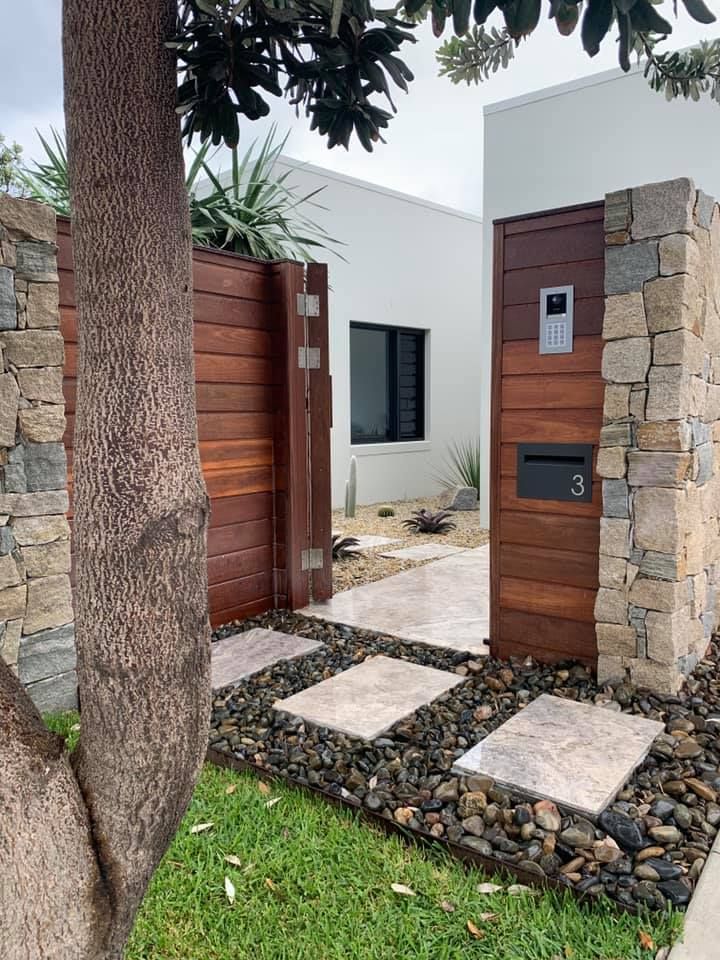 A Modern Entryway with A Wooden Gate — Creative Landscapes Coffs Harbour in Korora, NSW