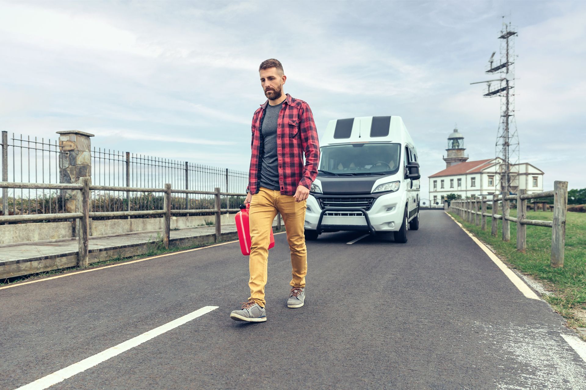 Man Holding Fuel Can