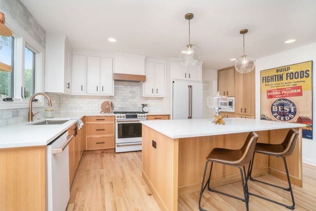 A Kitchen With Wooden Cabinets – Olathe, KS - JJR Painting