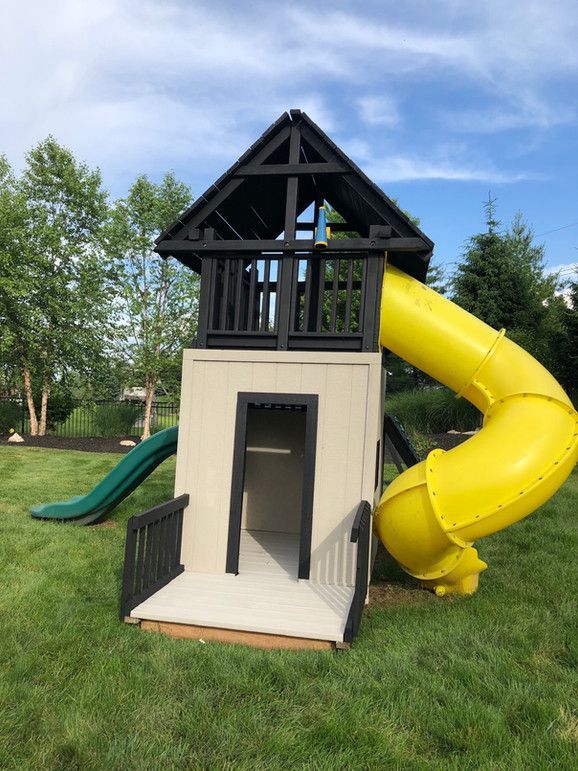 A Playground With A Yellow Slide And A Green Slide – Olathe, KS - JJR Painting