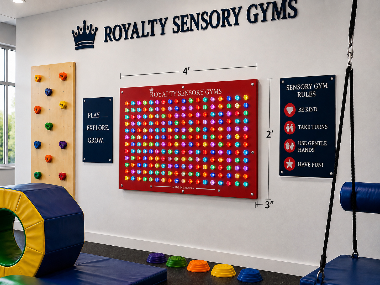 Custom sensory wall panels with climbing holds and activity features for indoor therapy gym spaces
