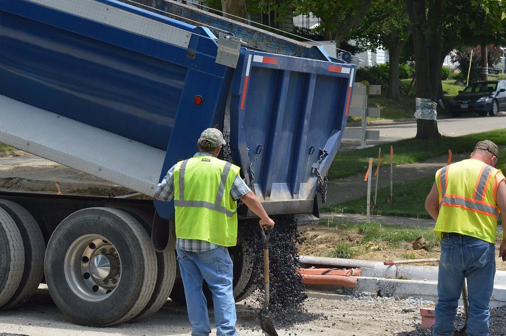 Truck Unloading the Asphalt — Cambridge, OH — Parnell & Associates