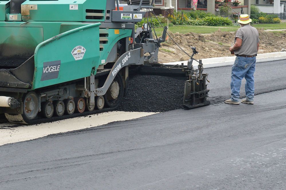 Man Checking the Quality of Road Paving — Cambridge, OH — Parnell & Associates