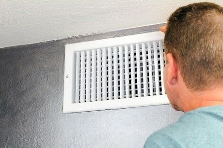 Man checking the Ventilation — Insulation Services in Northbrook, IL