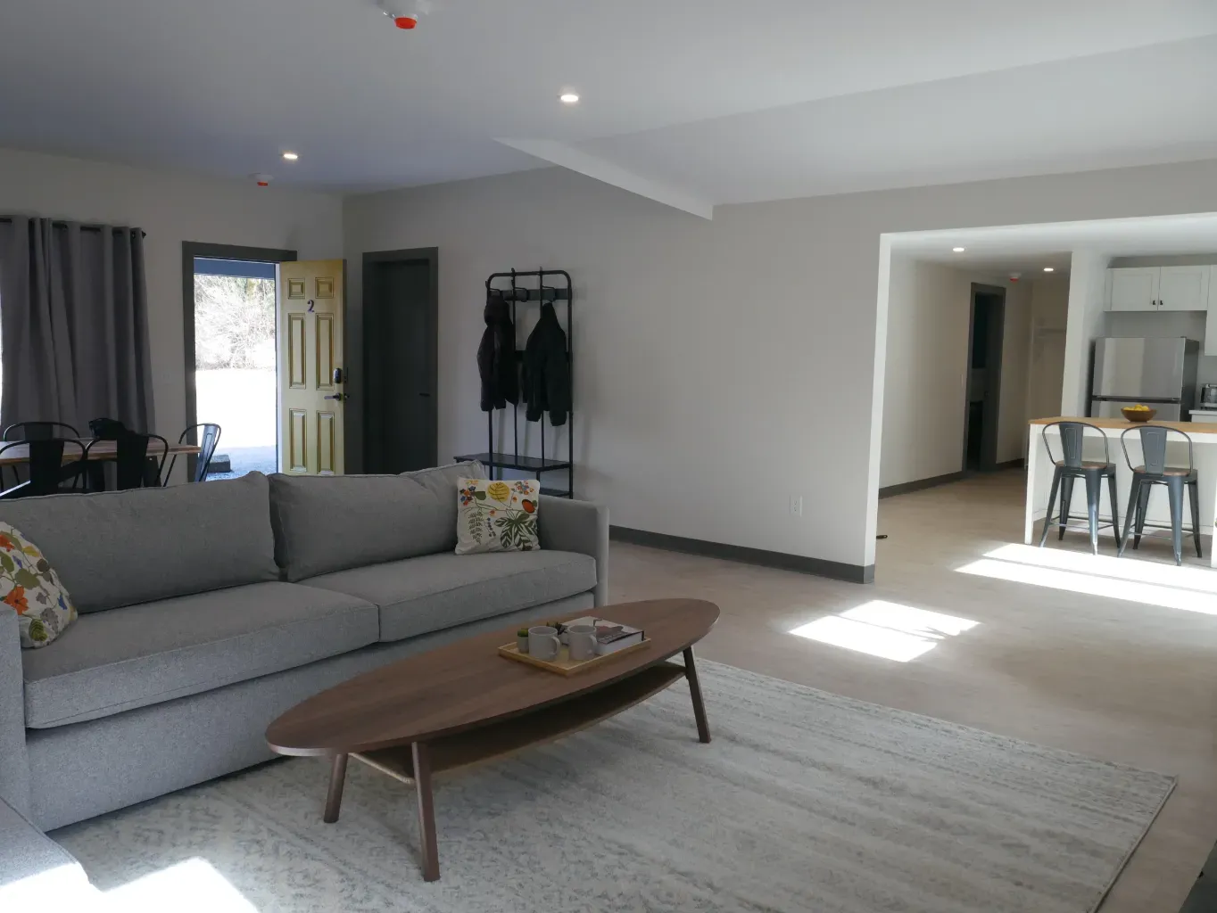 A living room with a couch and a coffee table