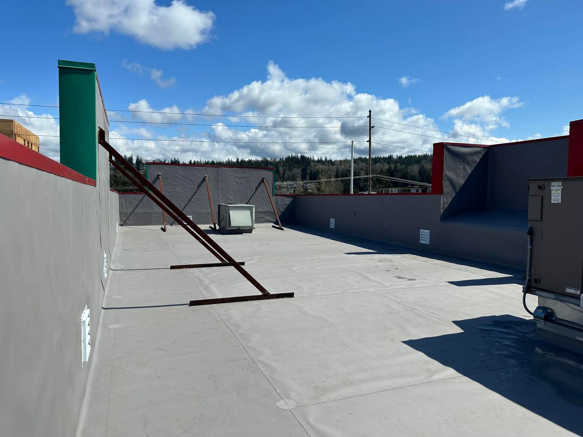 AFTER: El Agave's  new TPO- Flat Roof
