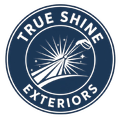 Logo for True Shine Exteriors: blue circle with white text and graphic of a pressure washer spraying water with starburst design.