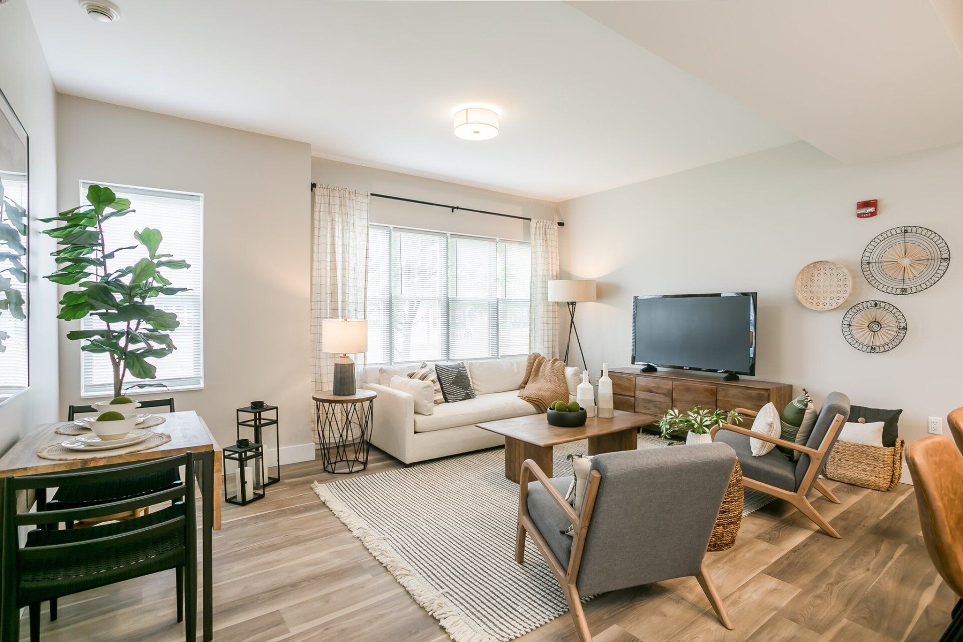 Living room with large windows and tall ceilings