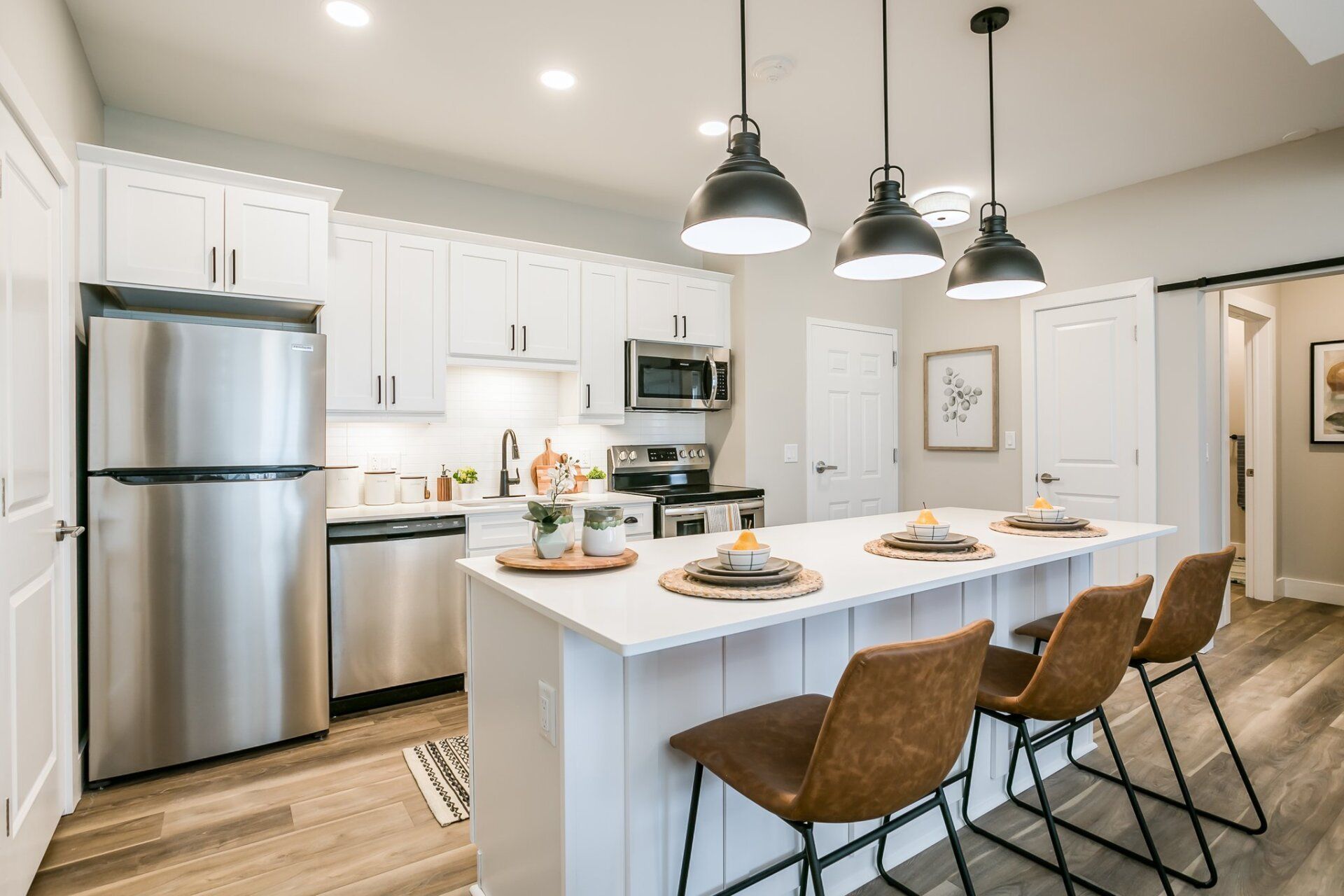 Kitchen with breakfast bar and stainless steel appliances