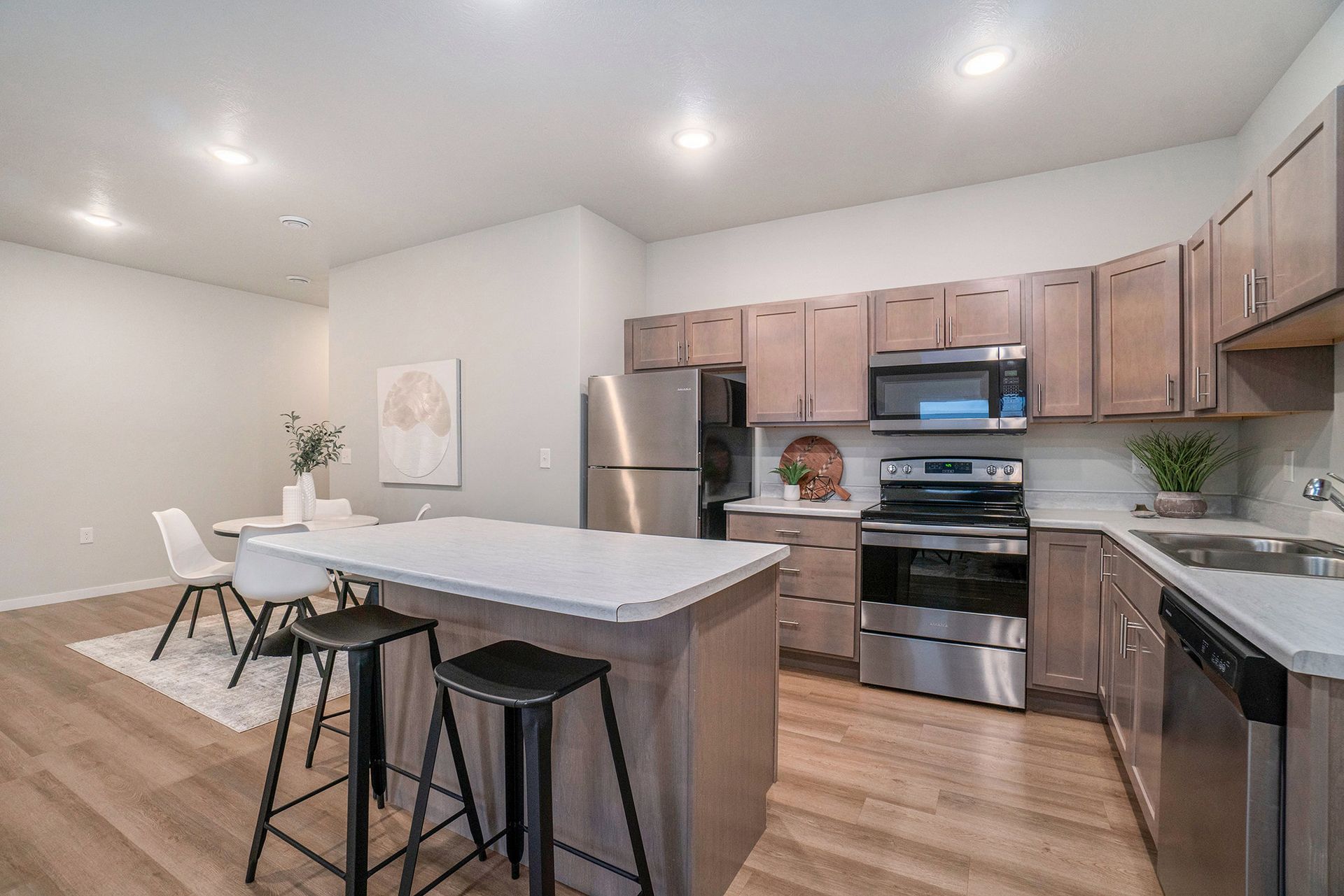 Kitchen with island and chairs