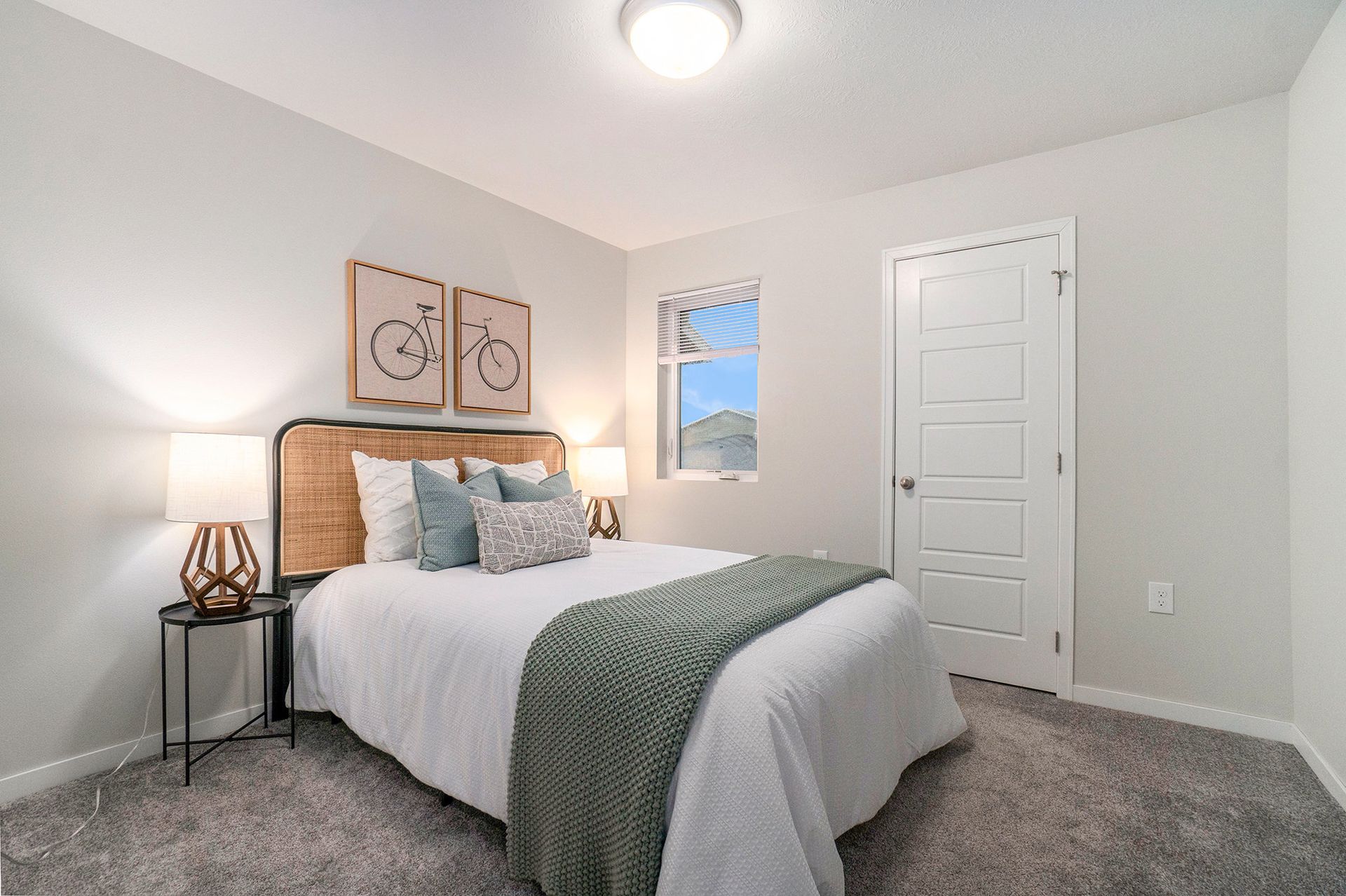 Bedroom with bed and door