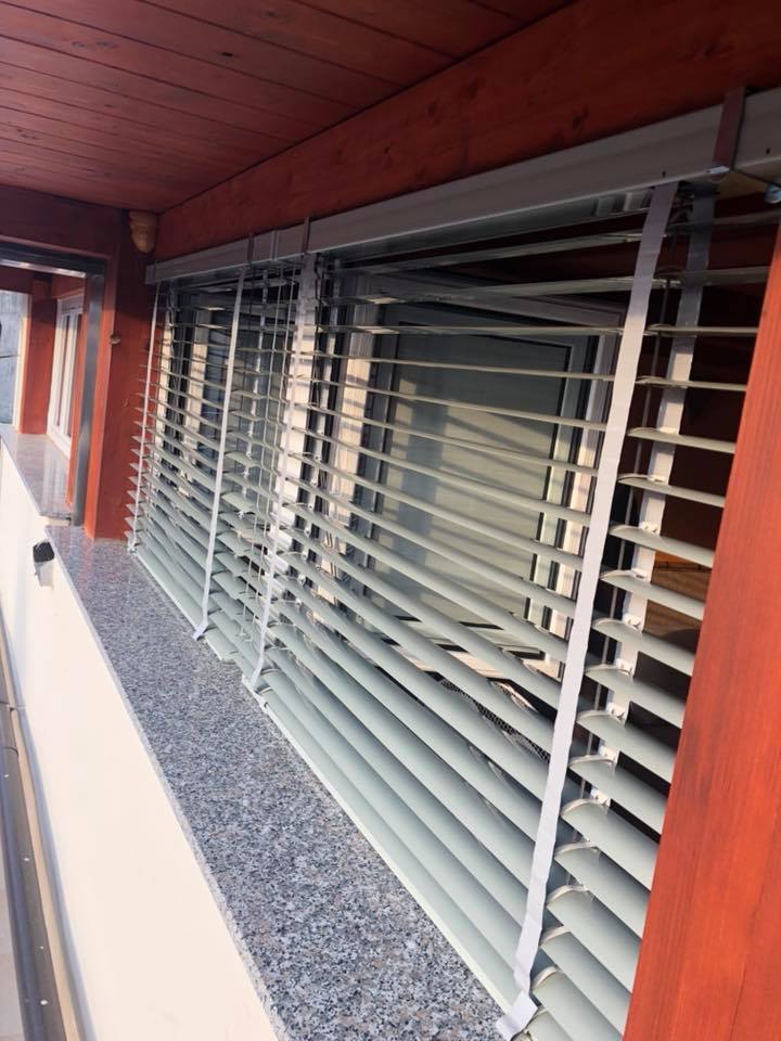 tende a rullo con corda