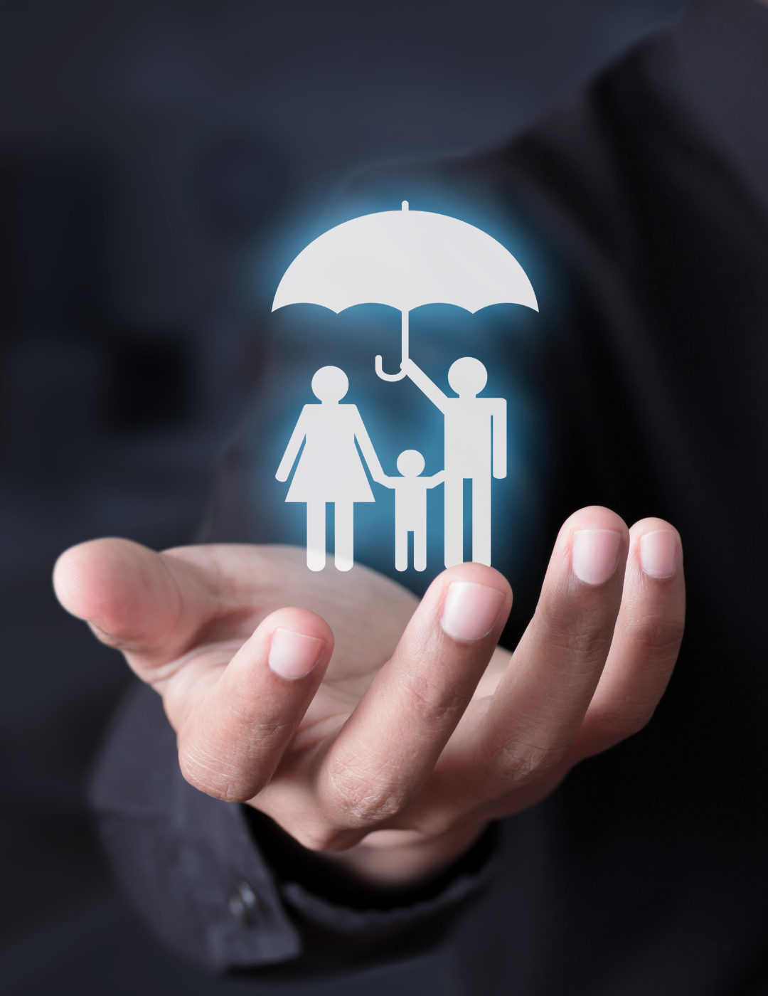 A person is holding a family under an umbrella