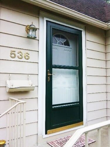 The front door of a house with the number 536 on it