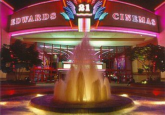 A fountain in front of the edwards 21 cinemas