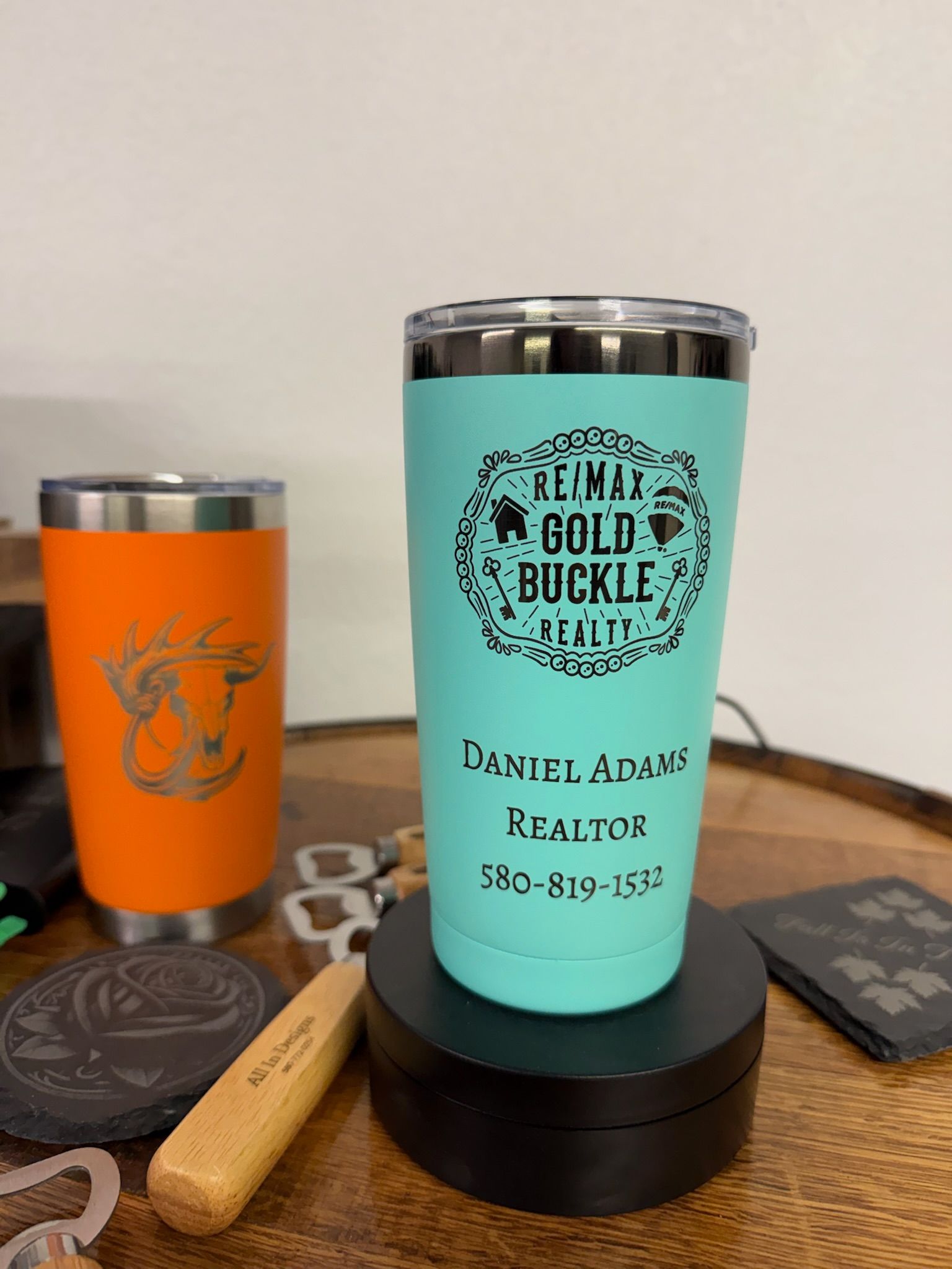 A light blue tumbler branded 