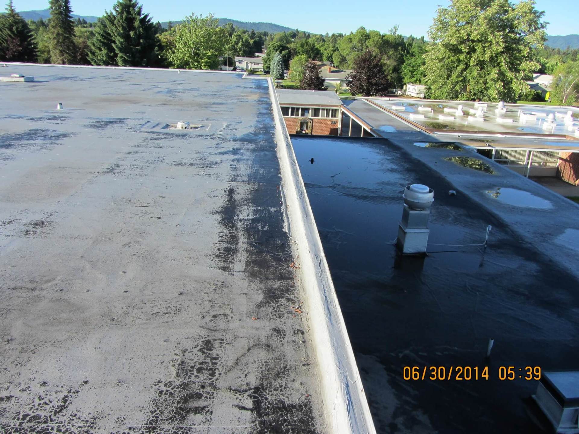 Flat Roof Before - Elder Roofing Inc - Spokane Valley WA