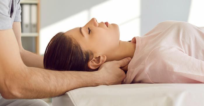 Person receiving Chiropractic Adjustments from Dr. Louis Granirer Holistic Chiropractor