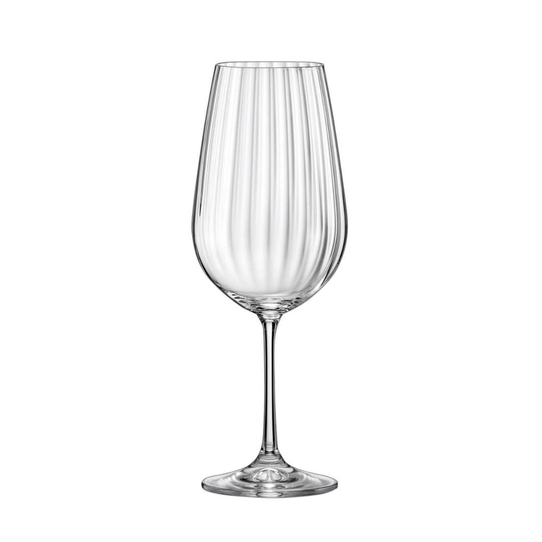 A clear wine glass with a striped design on a white background.