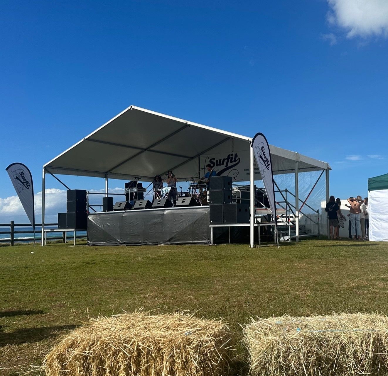 A stage with a sign that says surf on it