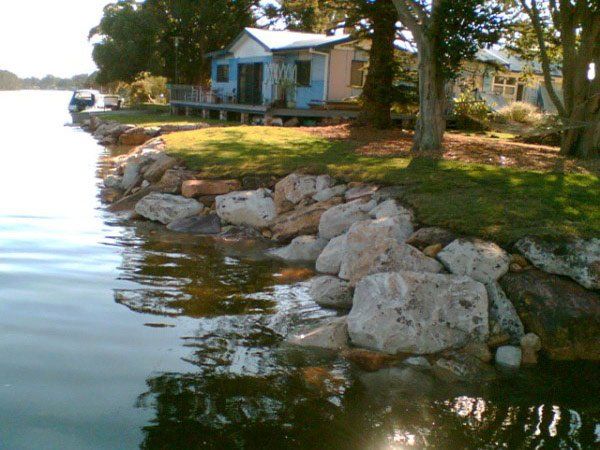 house next to body of water
