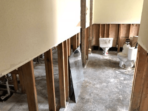water damage restoration in bathroom