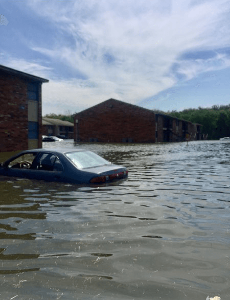 Flood Damage to cars and apartment buildings in Arkansas