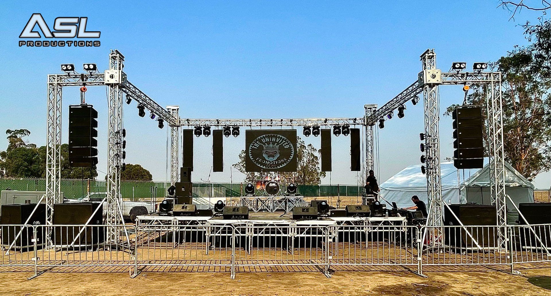 a large stage with a sign that says asl on it