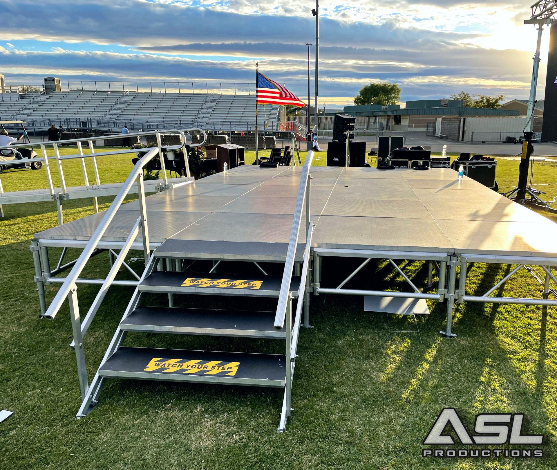 an asl productions stage with stairs leading up to it