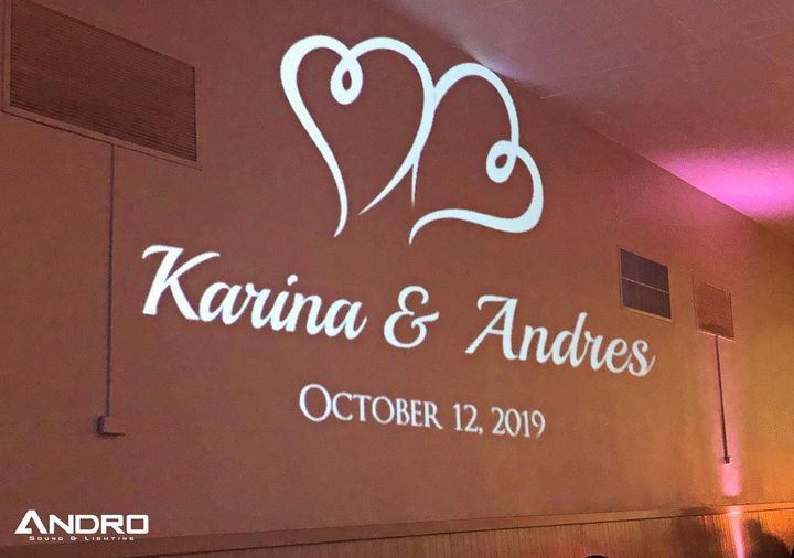 the name karina and andres is projected on a wall