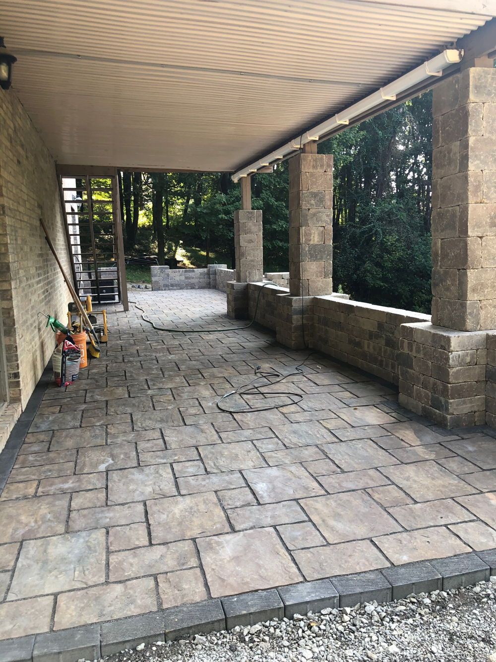 Hardscape — Cleaning Tools and New Hardscaped Floor in Edinburg, PA