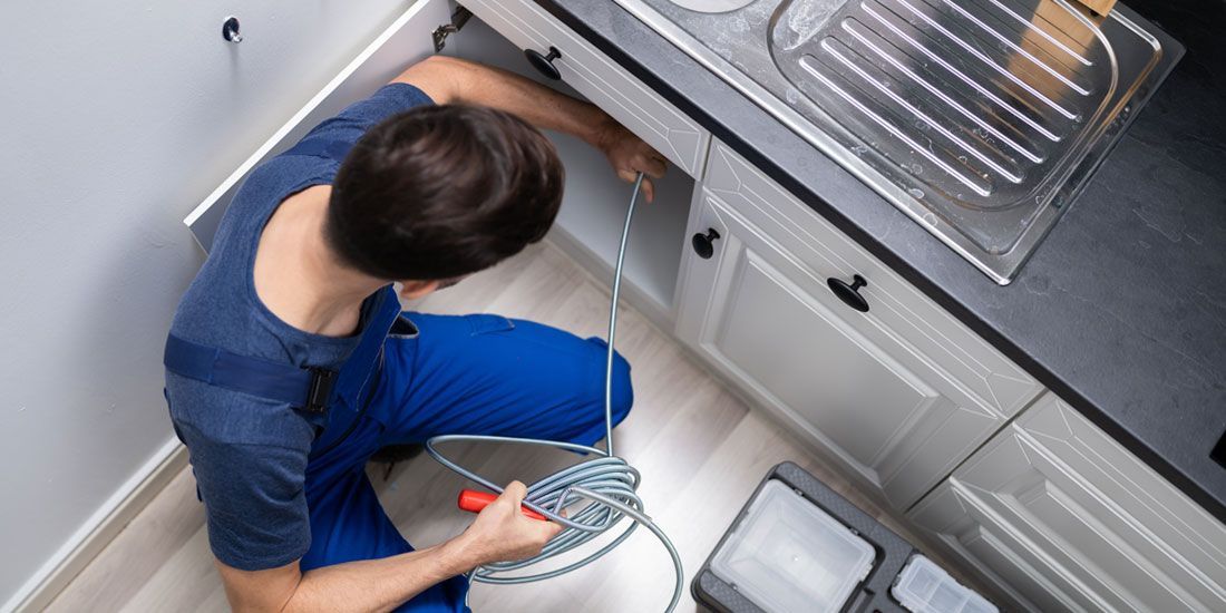 HVAC technician providing indoor air quality services