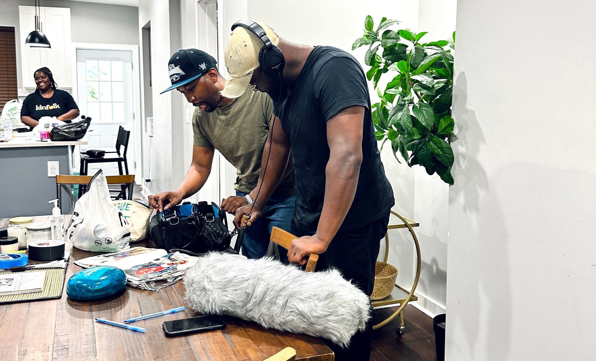 A close up of a video camera on a tripod.