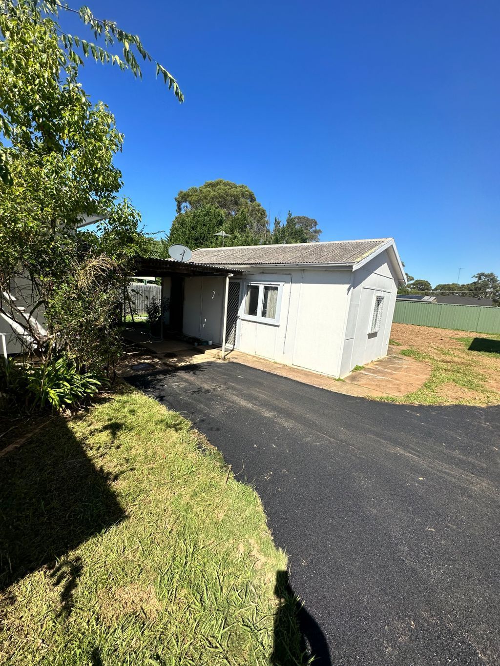 Sturdy And Well-constructed Concrete Road In Front Of House — About Time Plumbing & Civil Construction in Moss Vale, NSW