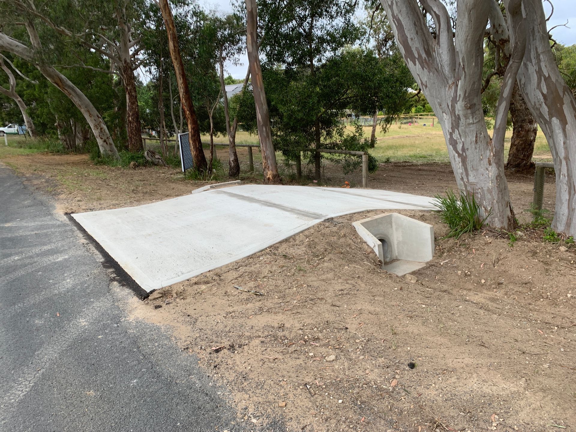 Durable concrete pathway providing convenient crossover access — About Time Plumbing & Civil Construction in Moss Vale, NSW