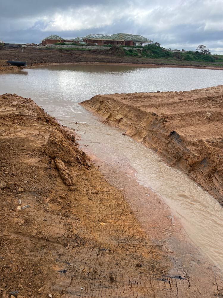 Flowing Water From Dam — About Time Plumbing & Civil Construction in Moss Vale, NSW